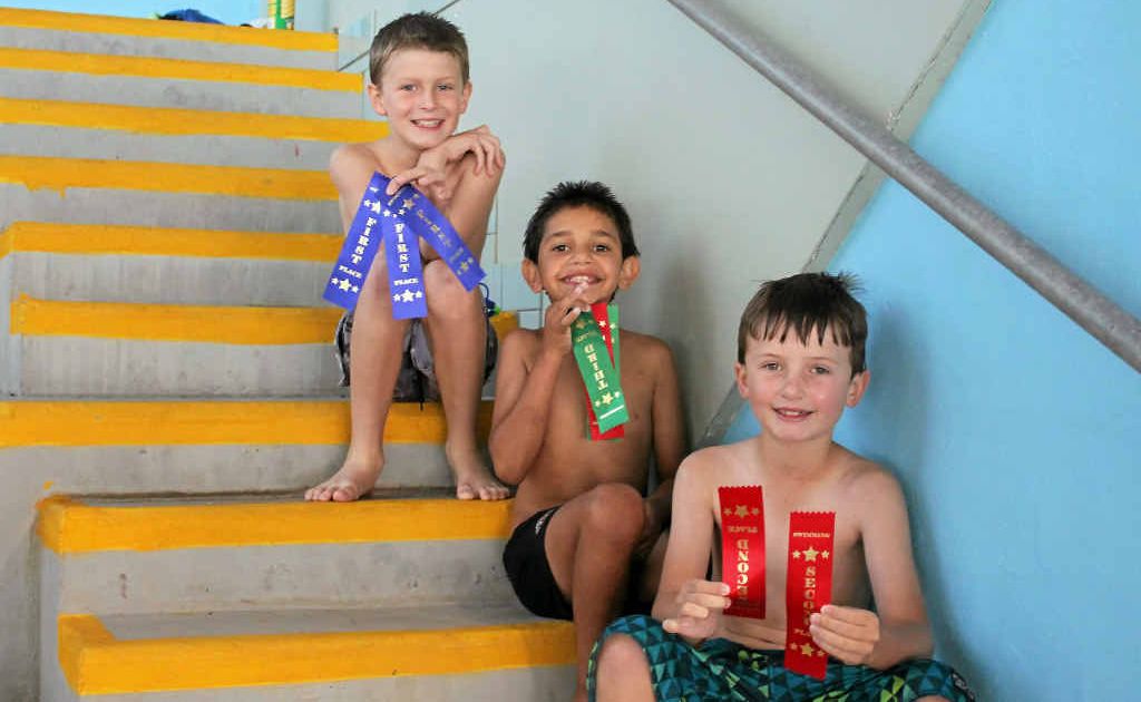 Bailey Rossiter, Jayden Clevin and Ethan Sticklen show off their ribbons. Bailey Rossiter, Jayden Clevin and Ethan Sticklen show off their ribbons.